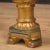 Italian torch holder from 19th century. Pleasantly carved, lacquered and gilded wooden and plaster object, pleasantly...
