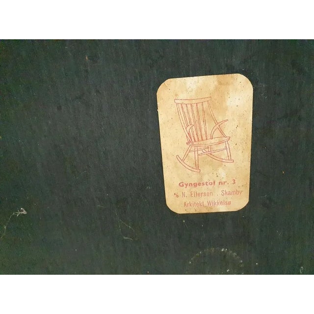 Rocking chair by Illum Wikkelso for Niels Eilersen, model Gyngestol nr 3. The black paint has been repainted. Marked...