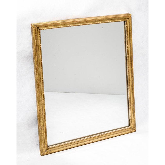 Elegant french louis xvi style giltwood mirror, 19th century. a refined 19th-century french louis xvi style mirror with a...