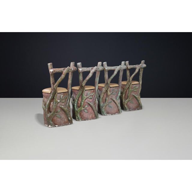 Sculptural Italian fiberglass chairs inspired by organic forms, suitable for both indoor and outdoor use. Ideal for...