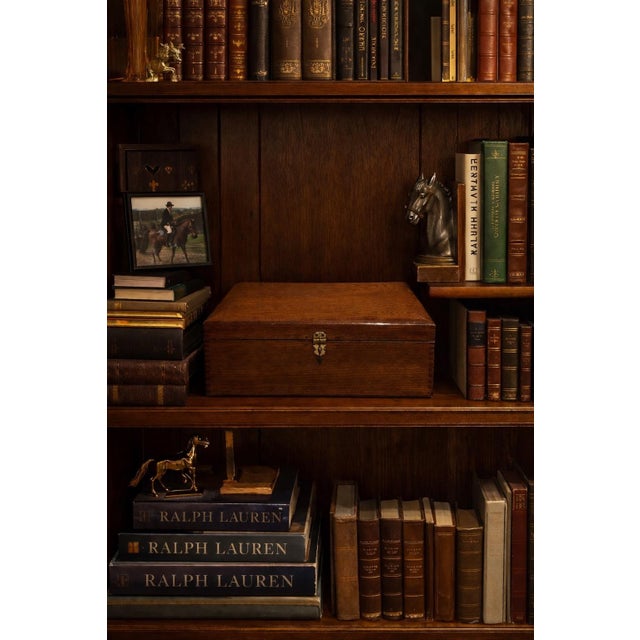 A beautifully crafted vintage solid wood storage box with a quiet, classic presence reminiscent of an English gentleman’s...