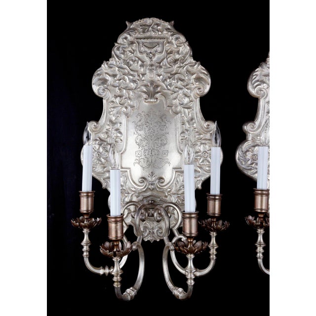 This pair of oversized silvered bronze sconces by EF Caldwell is a testament to the craftsmanship and design sensibilities...