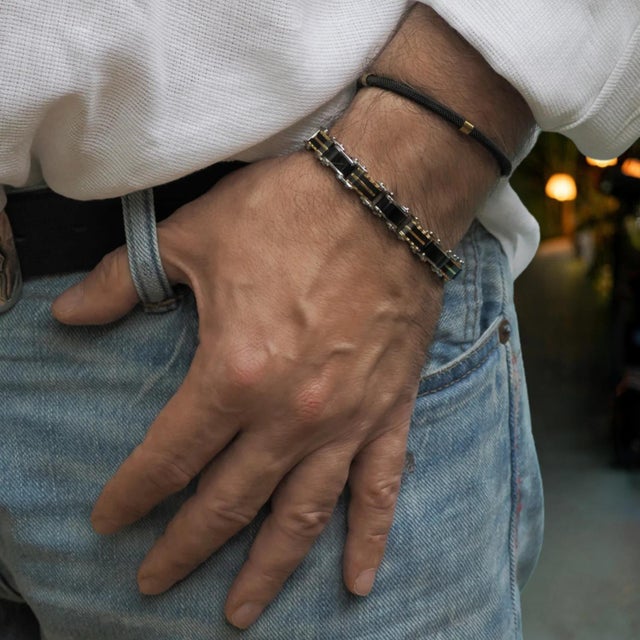 Elevate your look with this Men's Fashion Style Black Steel & Gold Bracelet, featuring a minimalist design that...