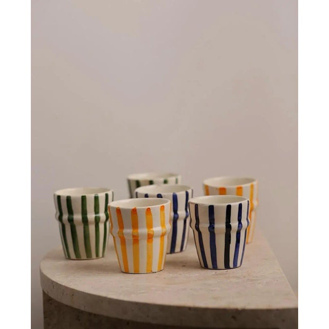A set of 6 handmade ceramic cups with Berber design and bright colors painted by a Moroccan craftsman from Marrakech. The...