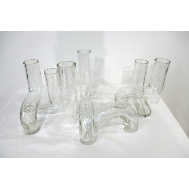 A set of six handcrafted Pidou clear thick glass vases that can be put together like a puzzle making a stunning unique...