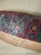 Pillow made from an early 20th Century Persian Mahal Rug in reds and blues. Poly-Fill insert and zipper closure. 16'' x 16''