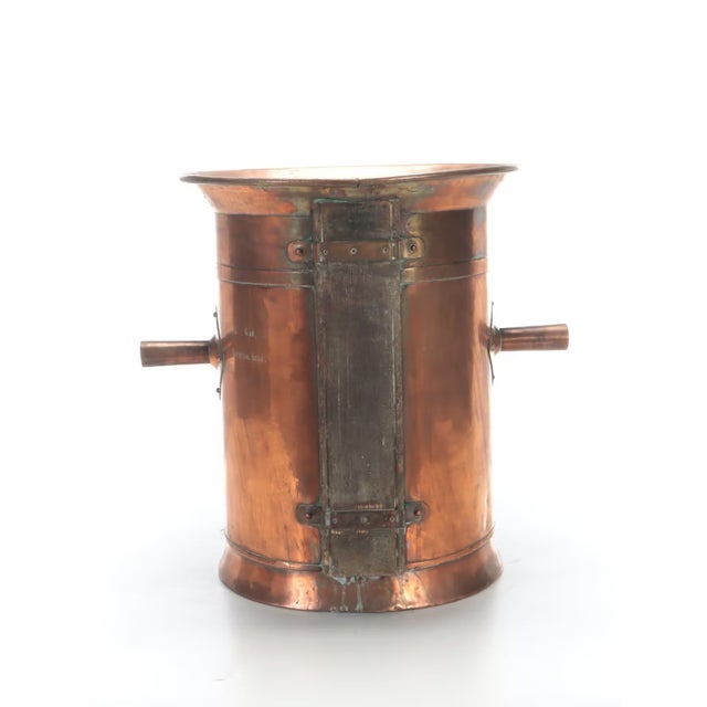 Bring a touch of vintage French charm home with this antique copper wine vat from France, dating to the 19th or early 20th...