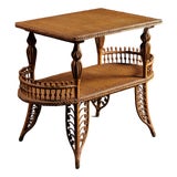 Late 19th Century Victorian Wicker Parlor Table With Gallery Shelf For Sale