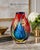 A striking example of modern studio art glass, this substantial hand-blown vase captures the bold elegance and technical...