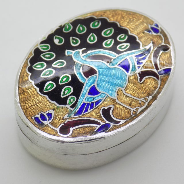 An oval trinket box crafted in Italy during the 1970s or 1980s. The box is stamped 925 which stands for Sterling Silver...