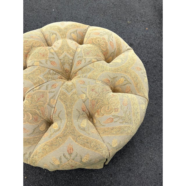 Pearson furniture floral upholstered round ottoman. Deep diamond upholstered tufting with a skirted base. Upholstered in a...
