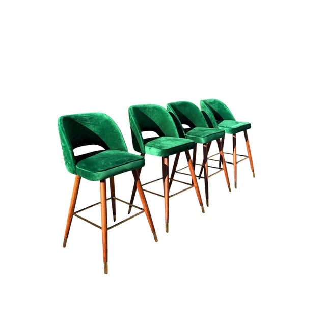 This stunning set of four modern barstools combines rich materials with sleek design for a striking statement. Each stool...