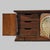 A substantial 1970s wood credenza distinguished by its long low profile, geometric paneled front and brass details. At 79...