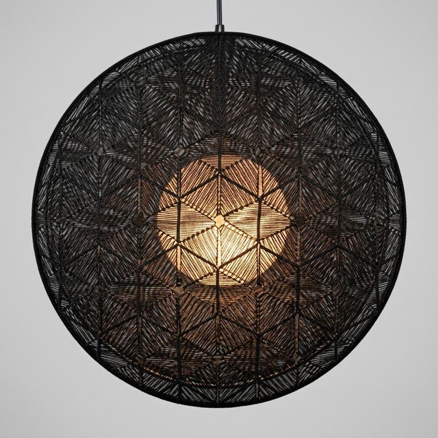 Handcrafted in the Philippines by Schema for Oggetti, the Hush Pendant Light showcases an exquisite balance of industrial...