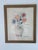 Print of Pablo Picaso with signature dated58. A nice simple work of flowers in a vase held by two hands . Probably worth...