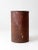 This is an antique metal flour bin circa late 19th century. The large red tin bin features a decorative floral design...