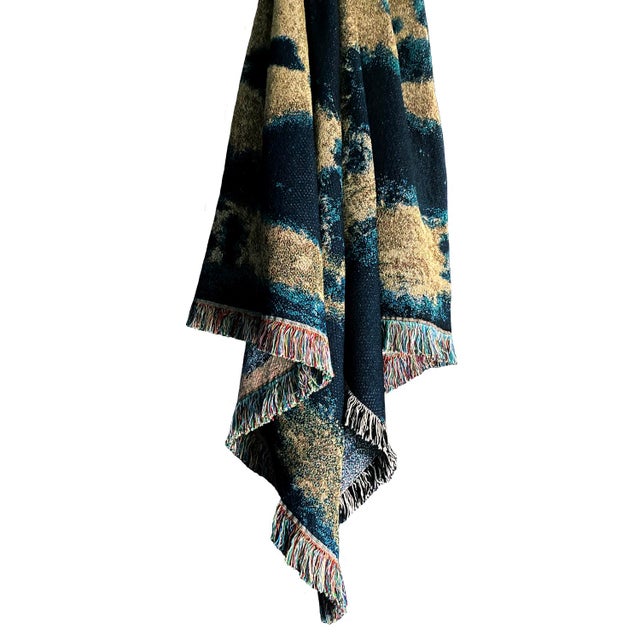 Gold yellow and indigo blue jacquard woven throw with fringed edges. Woven with recycled cotton on a jacquard loom, made...