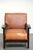This elegant armchair, featuring beautiful details, is crafted from cowhide leather in a timeless Art Deco design. The...