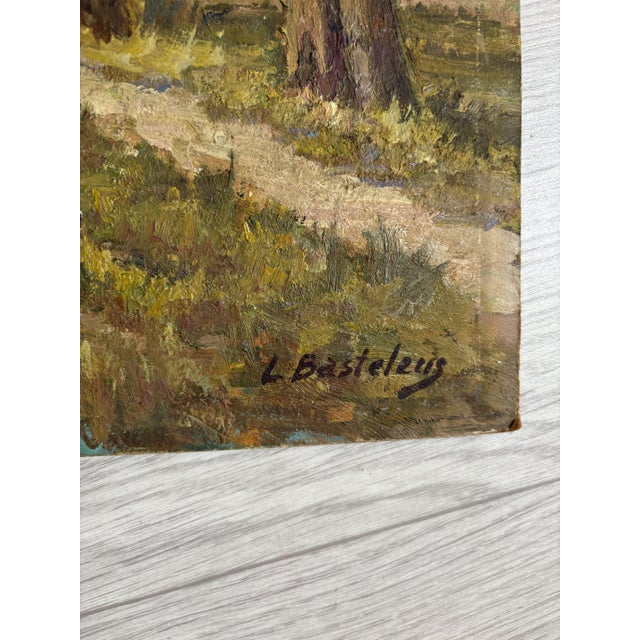 L. Basteleus, River Landscape Lined with Poplar Trees, Oil on Canvas, in Worn conditions. Designed 1890 to 1919