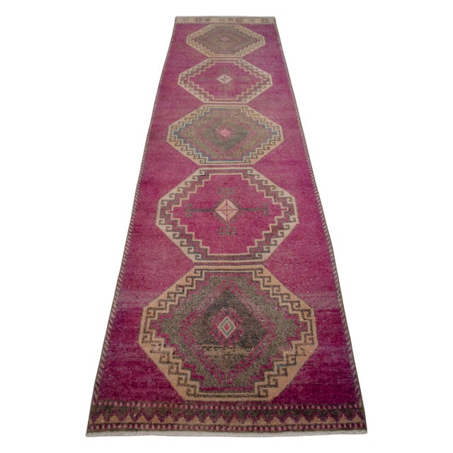 Woven in the villages of Southeastern Anatolia in the 1960s, this hand-knotted pile runner represents the domestic craft...