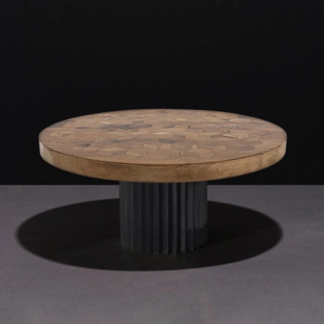 Dining table with ebonized Oak top from old Italian wine barrels and multifaceted pedestal in cast bronze. Inspired by...