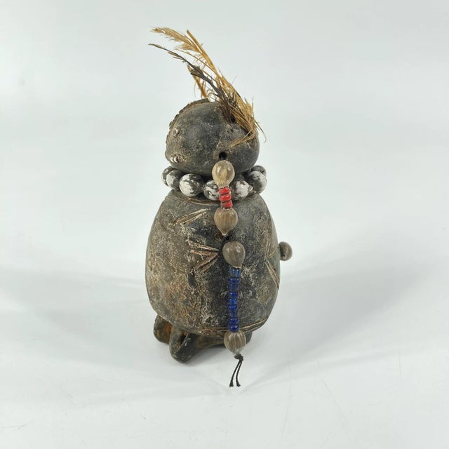 The Tikar people, steeped in a rich cultural heritage, craft exquisite sculptures embodying their spiritual beliefs.Â This...