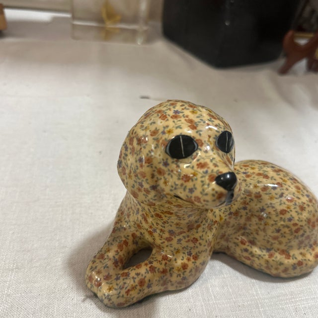 Up for consideration is a beautiful small floral ceramic dog sculpture. This would look lovely on display in your home and...