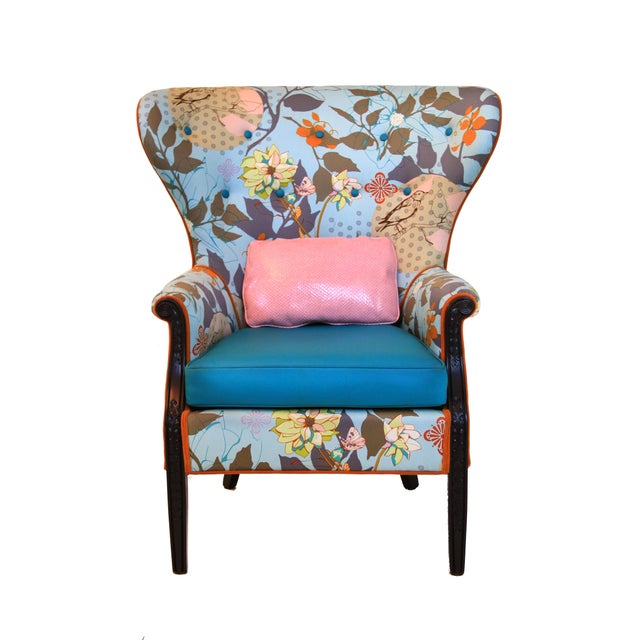 This fun Spring inspired chair is good for all seasons! A fun baby blue contemporary geometric floral adorns the frame. It...