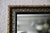 Simple yet charming, this wall mirror evokes the understated elegance of the early 1900s. Its blackened wood frame is...