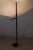 Floor lamp produced by Oluce in the '70s, design by Bruno Gecchelin. Structure in black painted metal, the rectangular...