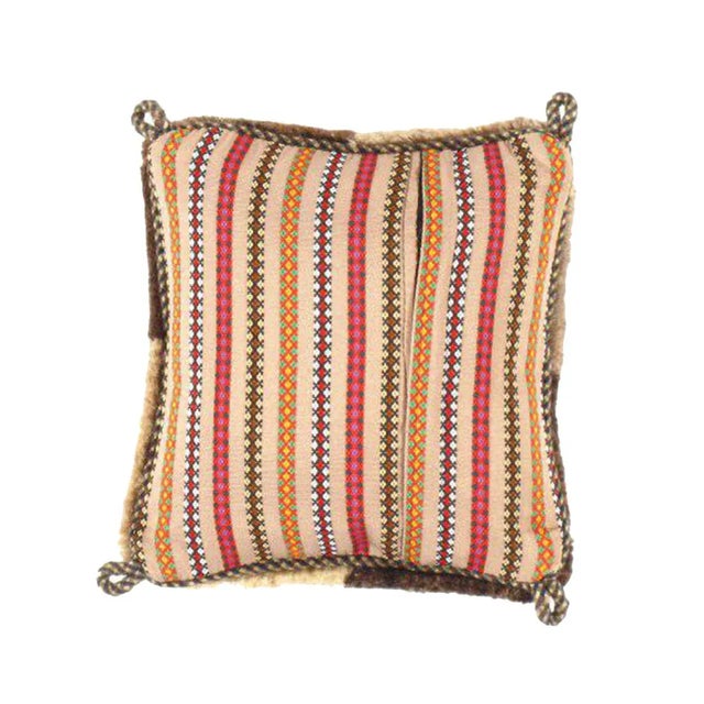 This Gabbeh pillow is made of high-quality old and rare Persian Gabbeh carpets. The piece was crafted with good workmanship.