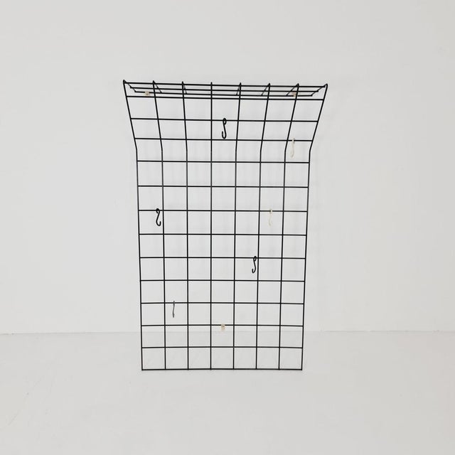 Clothing hanger Wardrobe by Nisse Strinning string design 60s The attached metal yellow, white, gray and black coat hooks...