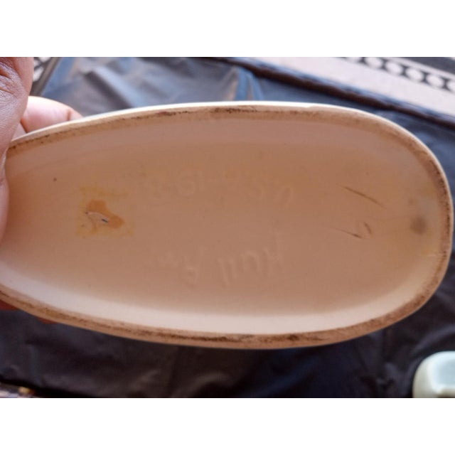 EXQUISITE Pair of Hull USA 9" Cornucopia Vases The EXQUISITE Pair of Hull USA 9" Cornucopia Vases is a stunning addition...