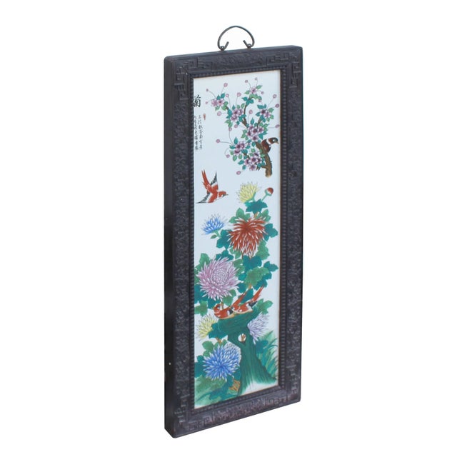 This is a vintage traditional Chinese oriental wall decoration piece made of wood frame and porcelain center plaque with a...