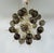 Italian sputnik chandelier with 30 smoky Murano glass globes and solid brass spikes mounted on brass frame in unlacquered...