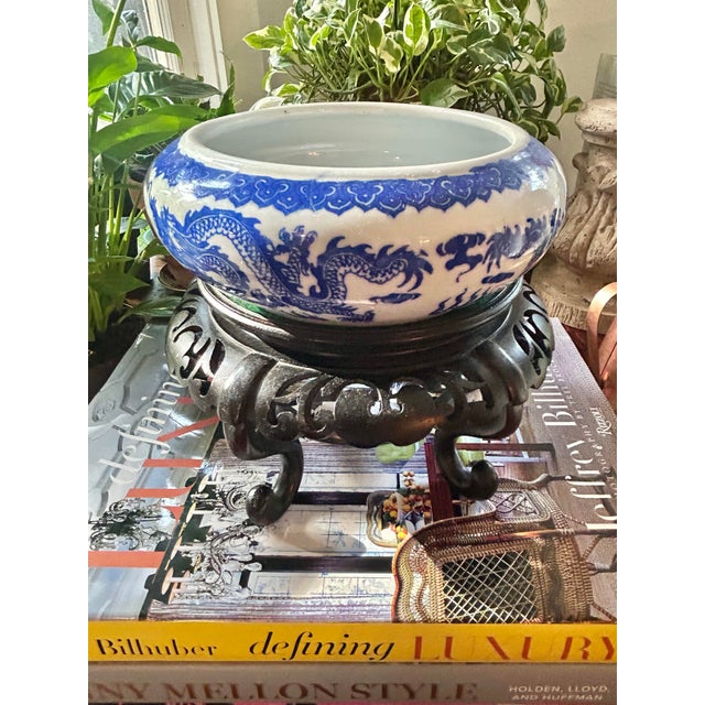 This is a vintage Chinese carved hardwood display stand, dating to approximately the mid-20th century. This handsome...