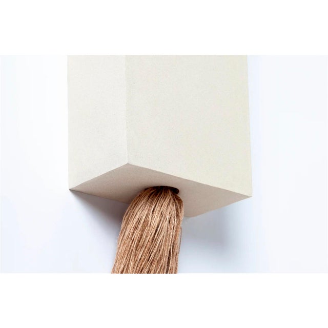 Thabit, our extraordinary new collection of handcrafted sculptures meticulously fashioned from gres and rafia, in...