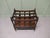 English Walnut Canterbury Magazine Stand This is a pretty little piece, it stands on neat brass casters and has elegant...