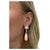 These gorgeous earrings feature two button angel skin coral tops surrounded by round brilliant cut diamonds, two removable...