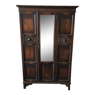 Early 20th Century Folk Art Carved Armoire/Wardrobe With Beveled Mirror Door For Sale
