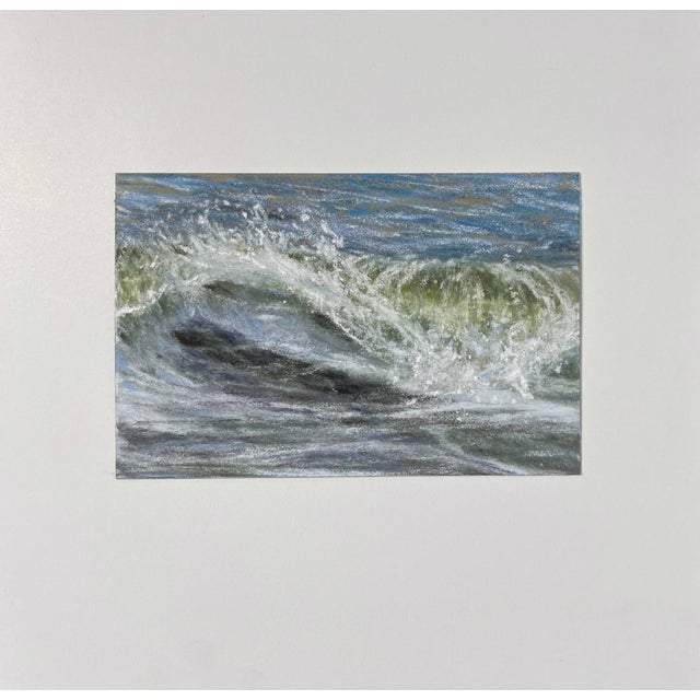 This artwork captures the dynamic movement of ocean waves, rendered in soft pastels that evoke the fluidity and energy of...