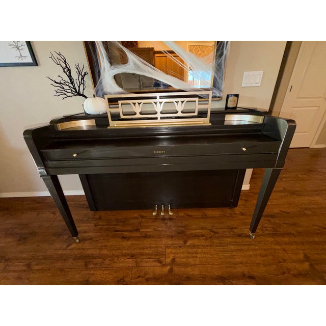 A timeless American original, reimagined. This 1957 Everett Model 17 spinet piano is a beautiful example of mid-century...