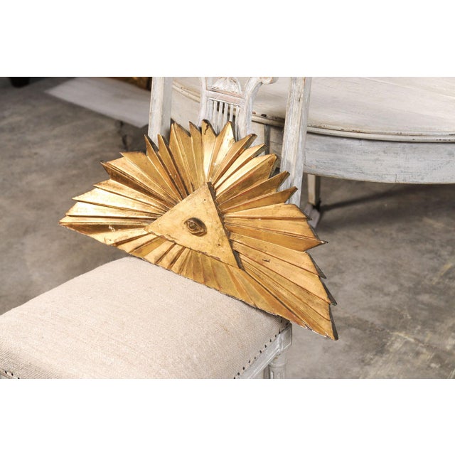 A striking and symbolic decorative object, this antique French gilded Œil de Providence (Eye of Providence) features a...