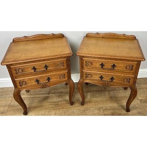 A beautiful pair of Vintage French Louis bedside tables, showcasing elegant curves and refined craftsmanship. These...