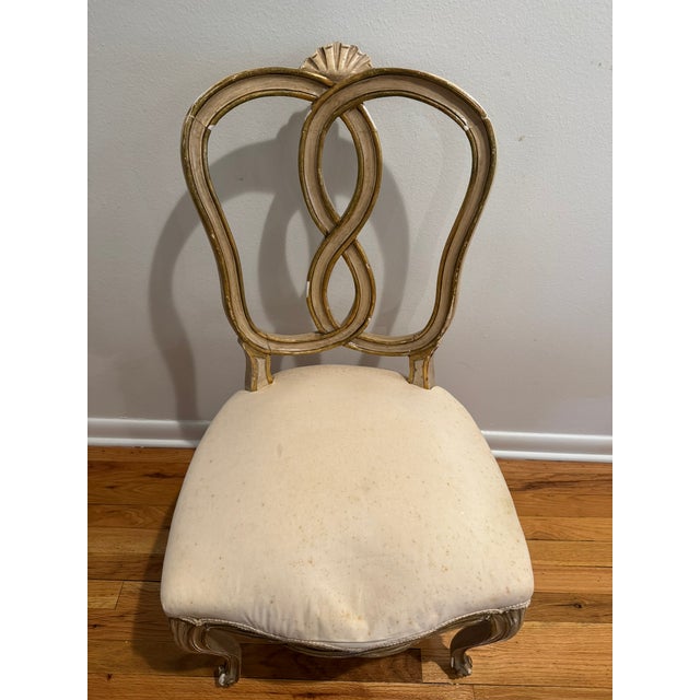 Decorative set of ten late 19th century Italian dining chairs in the Louis XV tradition, featuring carved wood frames with...