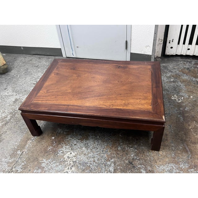 Design Plus Gallery presents an Antique Chinese Low Table. Dating to the 1920's, this low table has a rectangular wood top...