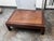 Design Plus Gallery presents an Antique Chinese Low Table. Dating to the 1920's, this low table has a rectangular wood top...