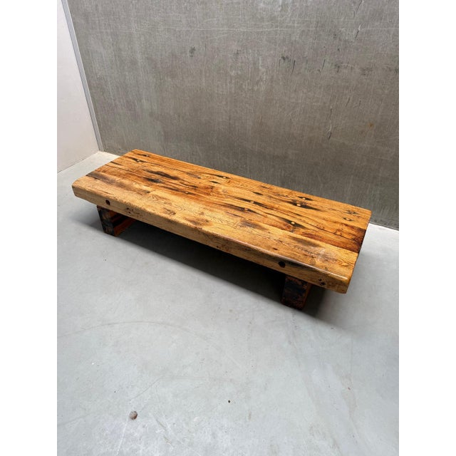 Meet this striking vintage wabi-sabi brutalist solid oak coffee table. This monumental piece combines raw, organic warmth...
