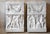 A pair of white marble relief frieze panels, circa 1920, each with a flower and fruit garland above a panel decorated with...