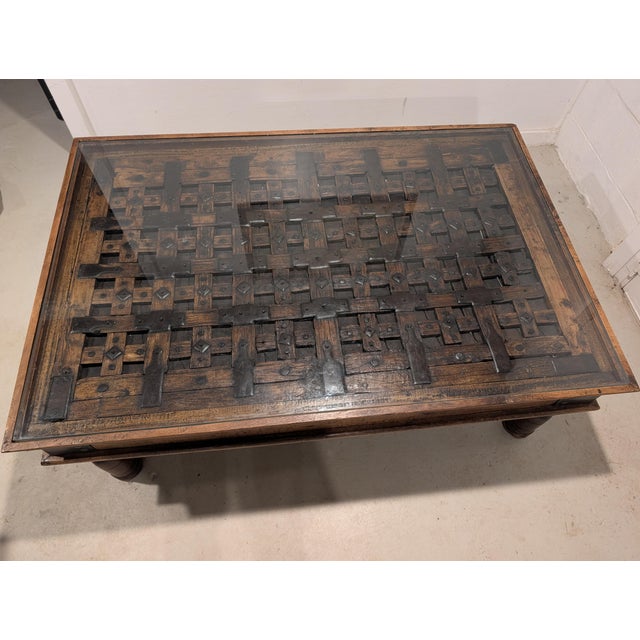 Late 20th Century Late 20th Century Repurposed Indian Courtyard Door Coffee Table With Hand-Forged Iron Hardware & Glass Top For Sale - Image 5 of 6